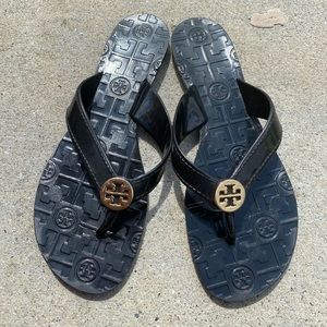 Tory Burch black w/gold logo flip flops